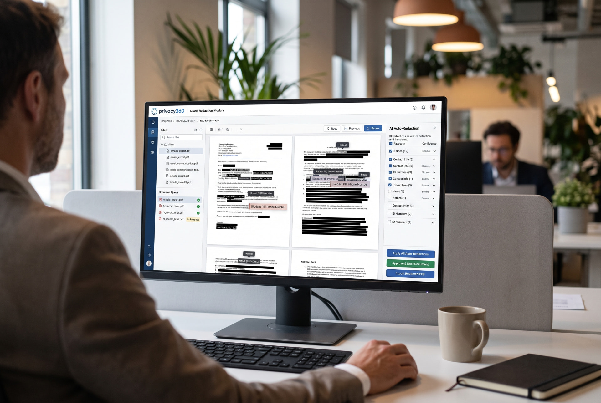 Illustration of a reviewer working on redacted DSAR documents at a desktop monitor.